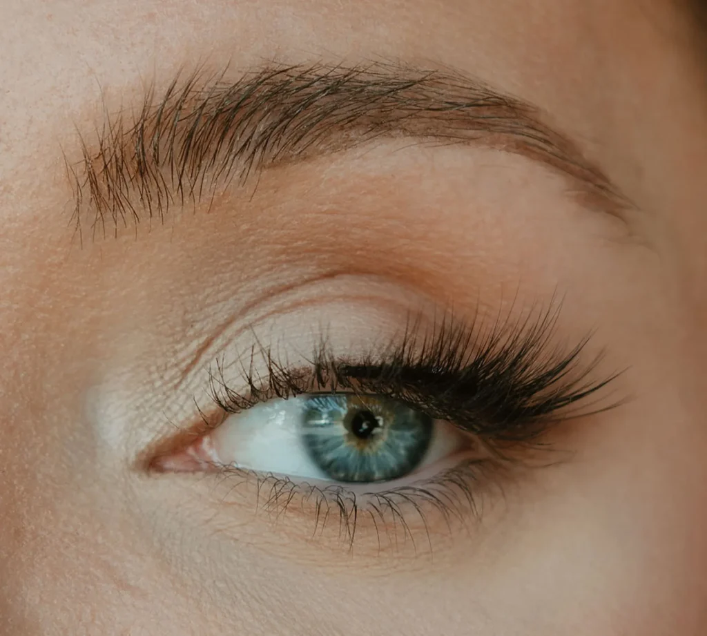 How to Apply False Eyelashes: Close-up of Stephanie Treadway's eye wearing Tread Beauty Lash for a flawless, natural finish.