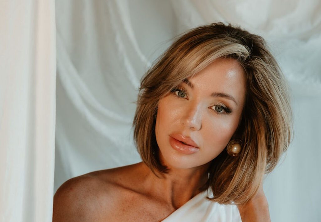 Stephanie Treadway, founder of Tread Beauty, holding lash packaging